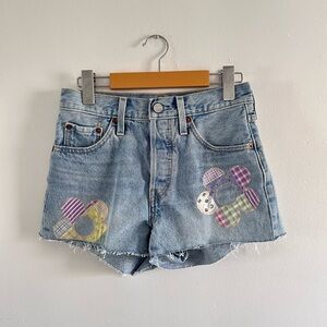 Levi’s 150 Free as a daisy patch cut off Jean shorts